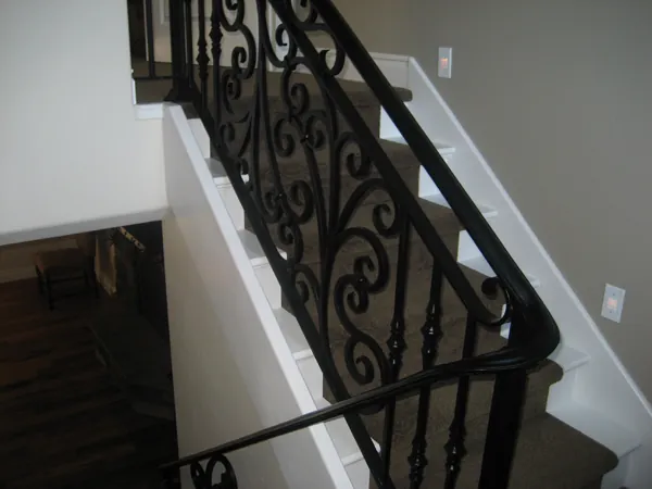Black iron staircase railing
