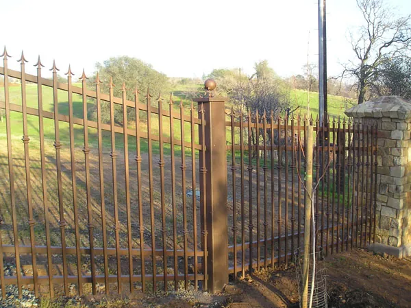Wrought iron fence and gate before powder coating